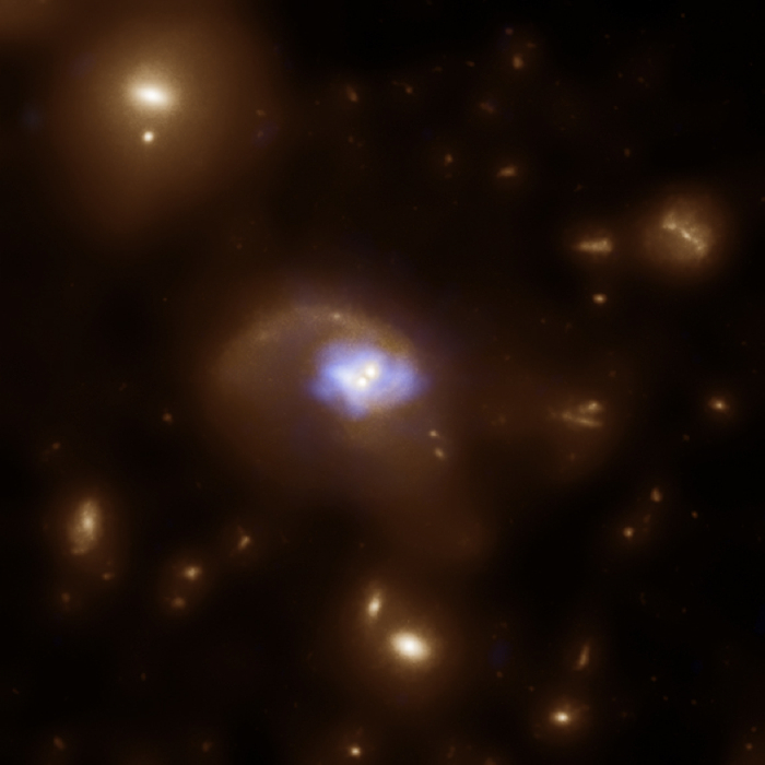 HST and Chandra image composite of recoiling black holes