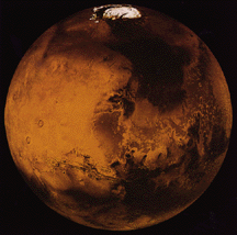 Photo of Mars showing red surface and white ice cap