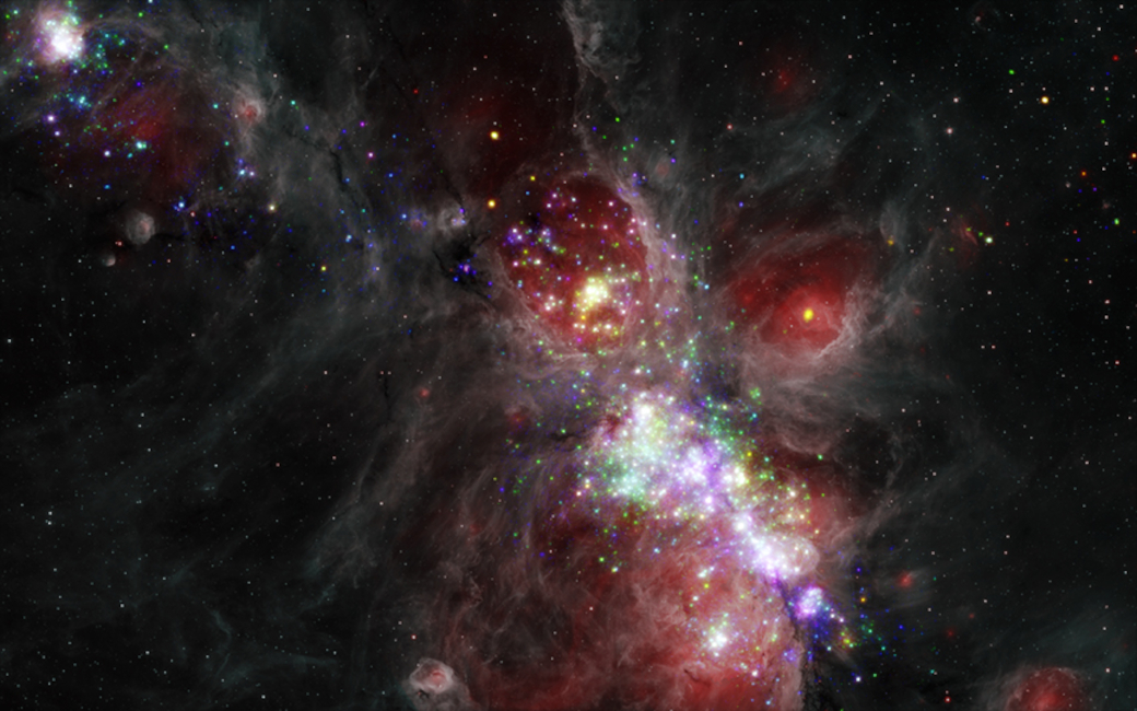 Composite Spitzer IR/Chandra X-ray image of the star forming region NGC 6334