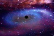 artist's concept of a black hole with surrounding matter